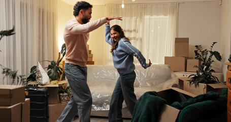 Love, moving and couple dance in new home to celebrate dream house or property investment. Man,...