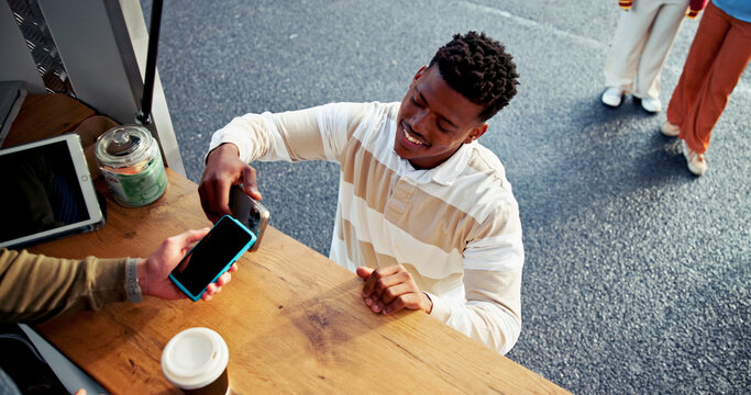 Food truck, machine and man with phone payment for NFC transaction, POS and easy checkout. Small business, above and cashier with smartphone tap for online banking, discount deal and customer service