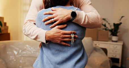 Love, couple and key for new house, moving and achievement for newlyweds in living room or...