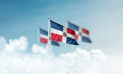 Dominican Republic national flags with mast waving in beautiful clouds. Dominican Republic flag for Republic Day and Independence Day.