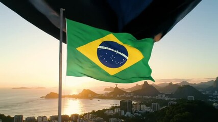 Brazilian flag waving against a sunset view of Rio de Janeiro, highlighting iconic landmarks and coastal scenery