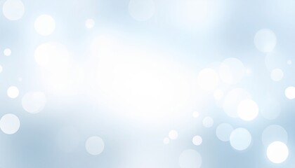 Abstract blue background with defocused bright bokeh lights perfect for a festive winter design