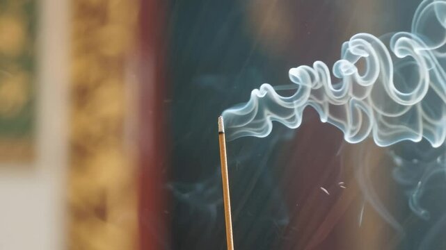Aromatic Incense Stick Emitting Fragrant Smoke, Close-Up Shot for Relaxation, Ritual, Meditation, Spa or Therapy Background - Soft Focus, Ambient