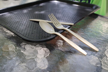 fork spoon and knife plastic set of disposable tableware and tray