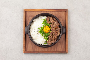 Bulgogi rice bowl is a dish made by marinating and grilling lean meat over a fire and then placing...