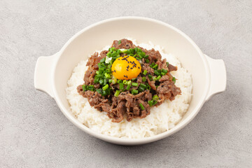 Bulgogi rice bowl is a dish made by marinating and grilling lean meat over a fire and then placing...