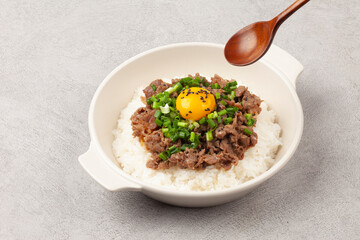 Bulgogi rice bowl is a dish made by marinating and grilling lean meat over a fire and then placing...