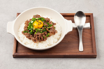 Bulgogi rice bowl is a dish made by marinating and grilling lean meat over a fire and then placing...