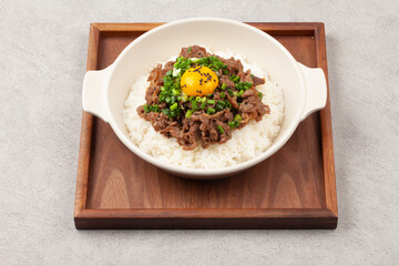 Bulgogi rice bowl is a dish made by marinating and grilling lean meat over a fire and then placing...