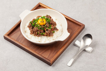 Bulgogi rice bowl is a dish made by marinating and grilling lean meat over a fire and then placing...
