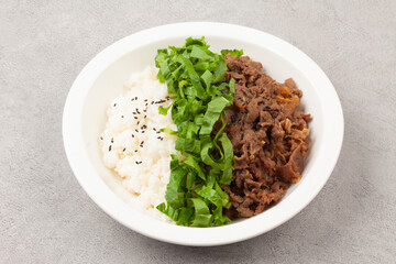 Bulgogi rice bowl is a dish made by marinating and grilling lean meat over a fire and then placing...