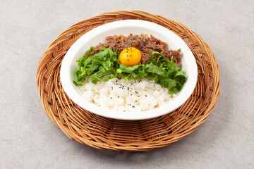 Bulgogi rice bowl is a dish made by marinating and grilling lean meat over a fire and then placing...