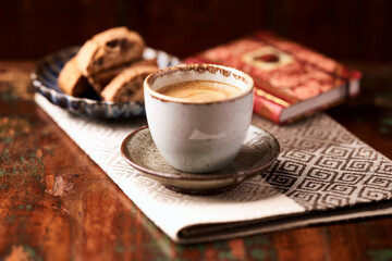 Cup of coffee on wooden background. Soft focus. Copy space	