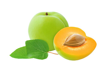 a green apple and a half of a peach with a leaf