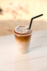 Iced latte. Coffee drink. Refreshing beverage. Cold coffee. Milk and espresso. Summer drink. Cafe....