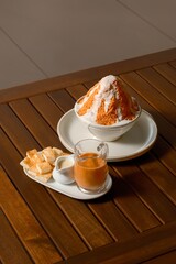 A visually appealing, high-resolution image of a Thai Tea Bingsu dessert perfectly optimized for commercial use.