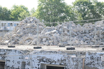 A pile of rubble sits on top of a building