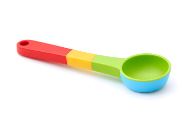 Bright rainbow-colored measuring spoon for children's cooking or educational use. Fun, playful design on white background. Ideal for food, parenting, or DIY content.
