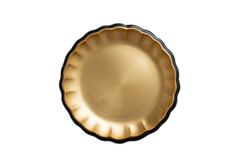 a gold plate with a black rim on a white background