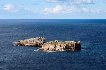 Granite Islets called The Nuggets below the Cape Tourville Lighthouse - Coles Bay, Tasmania, Australia