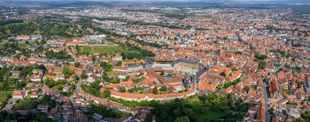 Aerial panorama view around the old town in the city Bamberg in Bavaria on an sunny spring day in Germany	
