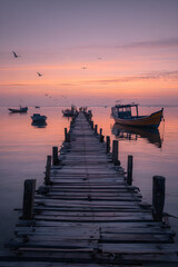 Fototapeta premium Serene Morning at the Wharf: A Harmonious Blend of Nature and Tranquility