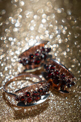 Close-up of jewelry on gold gust