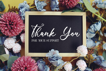 Thank You For Your Supporty text with flowers decoration on yellow background