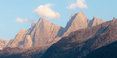 Naklejka premium The Piz Badile, Pizzo Cengalo peaks in the Bregaglia range - Switzerland in evening light.