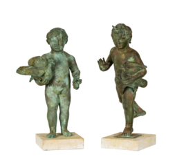 statue of a man with a sword Two Ancestor Figures "adu Zatua" Indonesia Nias