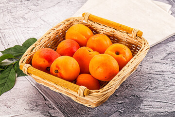 Raw ripe sweet apricots heap