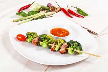Thai Street foof satay with bacon and broccoli