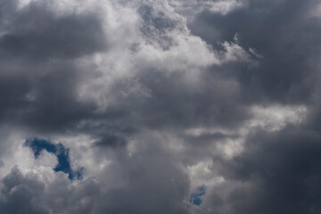 Obraz premium beautiful picture of clouds, a mixture of light and dark clouds, dramatic sky, yin - yang