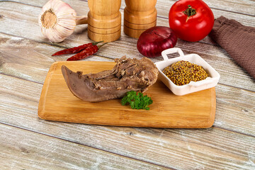 Steamed pork tongue with mustard