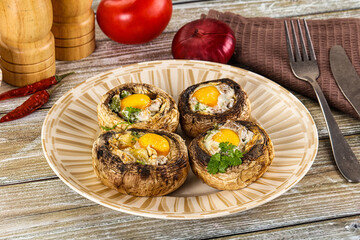Baked champignon with quail egg