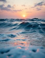 Naklejka premium A sea of endless waves shimmers under the soft glow of the morning sunrise, bathed in golden hour light that brings warmth and tranquility to the peaceful ocean view