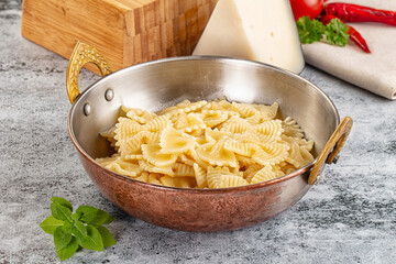 Italian pasta Farfalle with oil