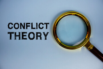 Conflict Theory text with magnifying glass on blue background