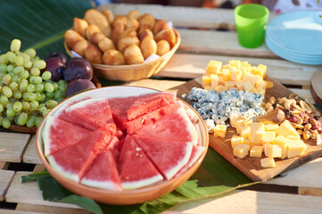 pallet with food in a park, holiday picnic