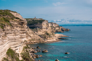 White cliffs frame the deep blue Mediterranean in an iconic view from Corsica’s Promenade des Falaises