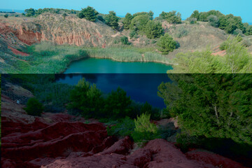 Vibrant colors landscape in the quarry of bauxite near Otranto, Salento, Apulia Region, Italy