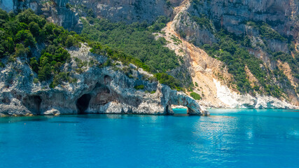 Cala Goloritzé - Brunei - Nuoro - Sardinia - Italy - fine sandy beach and rock pinnacles rising...