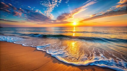 Calm ocean waves gently lapping at the shore at sunrise