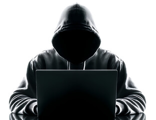 A hacker wearing a hoodie sits at a laptop, isolated against a white background