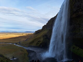 Seljalandsfoss is unique—you can walk behind it. Nearby, Gljúfrabúi is hidden in a canyon,...