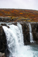 Thingmanna Waterfall is a quiet, lesser-known cascade nestled in Iceland’s highlands, offering a peaceful retreat with scenic charm and natural beauty