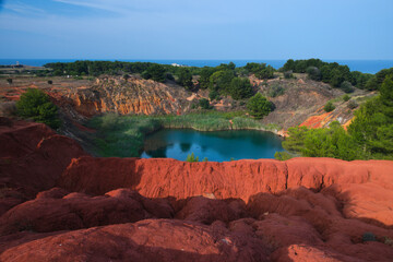 Vibrant colors landscape in the quarry of bauxite near Otranto, Salento, Apulia Region, Italy