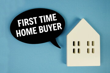 First Time Home Buyer text message on speech bubble with house model on blue background