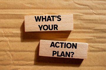 What's your action plan message written on wooden blocks on cardboard background. Conceptual what's...