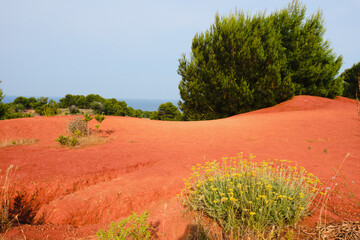 Vibrant colors landscape in the quarry of bauxite near Otranto, Salento, Apulia Region, Italy